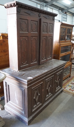 A 19th century Continental pine three door buffet with associated mahogany top, length 143cm, depth 67cm, height 196cm